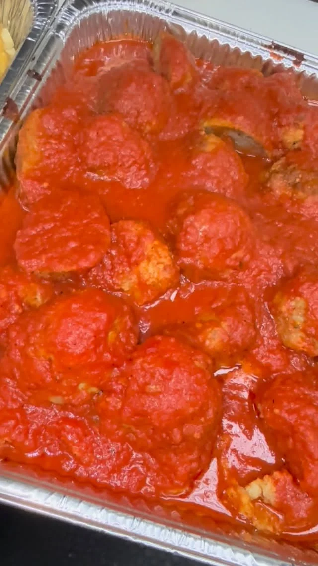 A tray of Anthony’s meatballs in tomato sauce