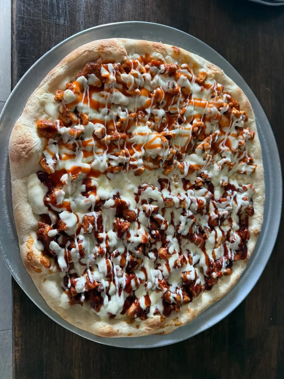 A freshly made Anthony’s specialty pizza